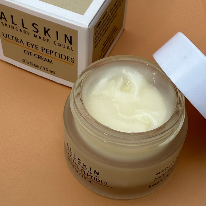 Peptide Eye Cream jar with top on side and box