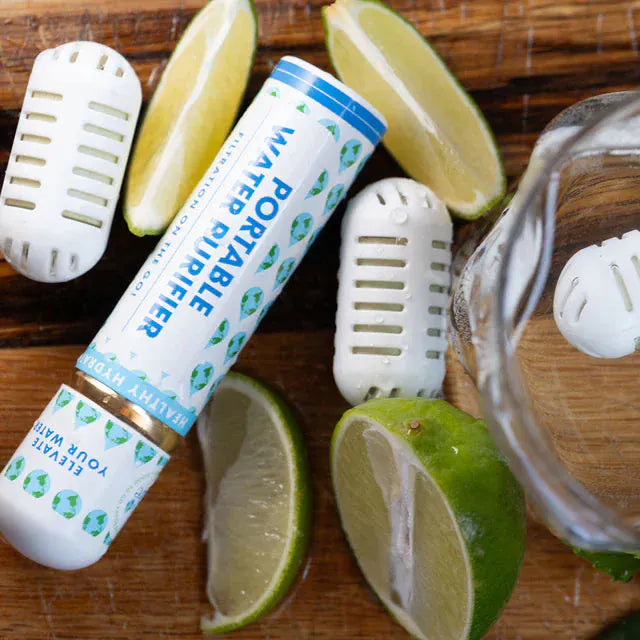 Portable diffuser with lime slices on a wooden surface